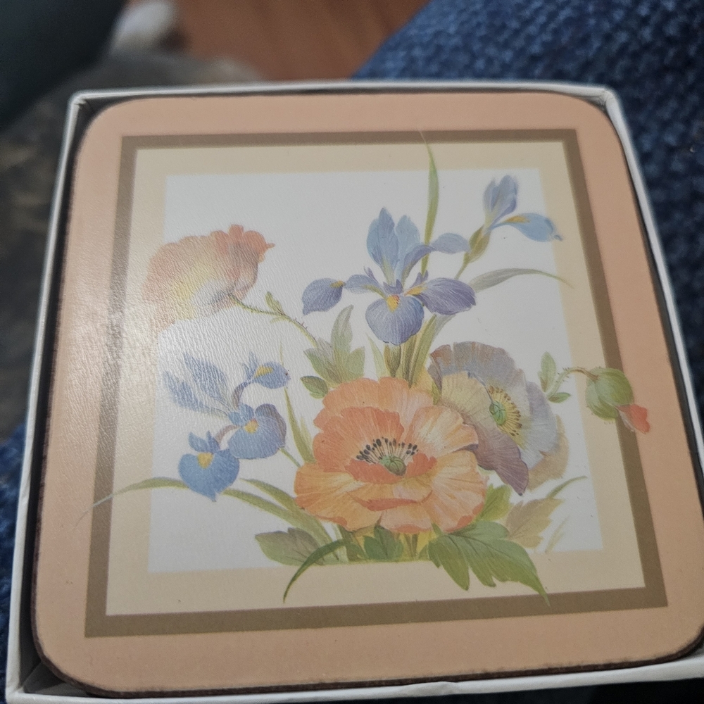Floral Coaster Set with Orange and Blue Accents